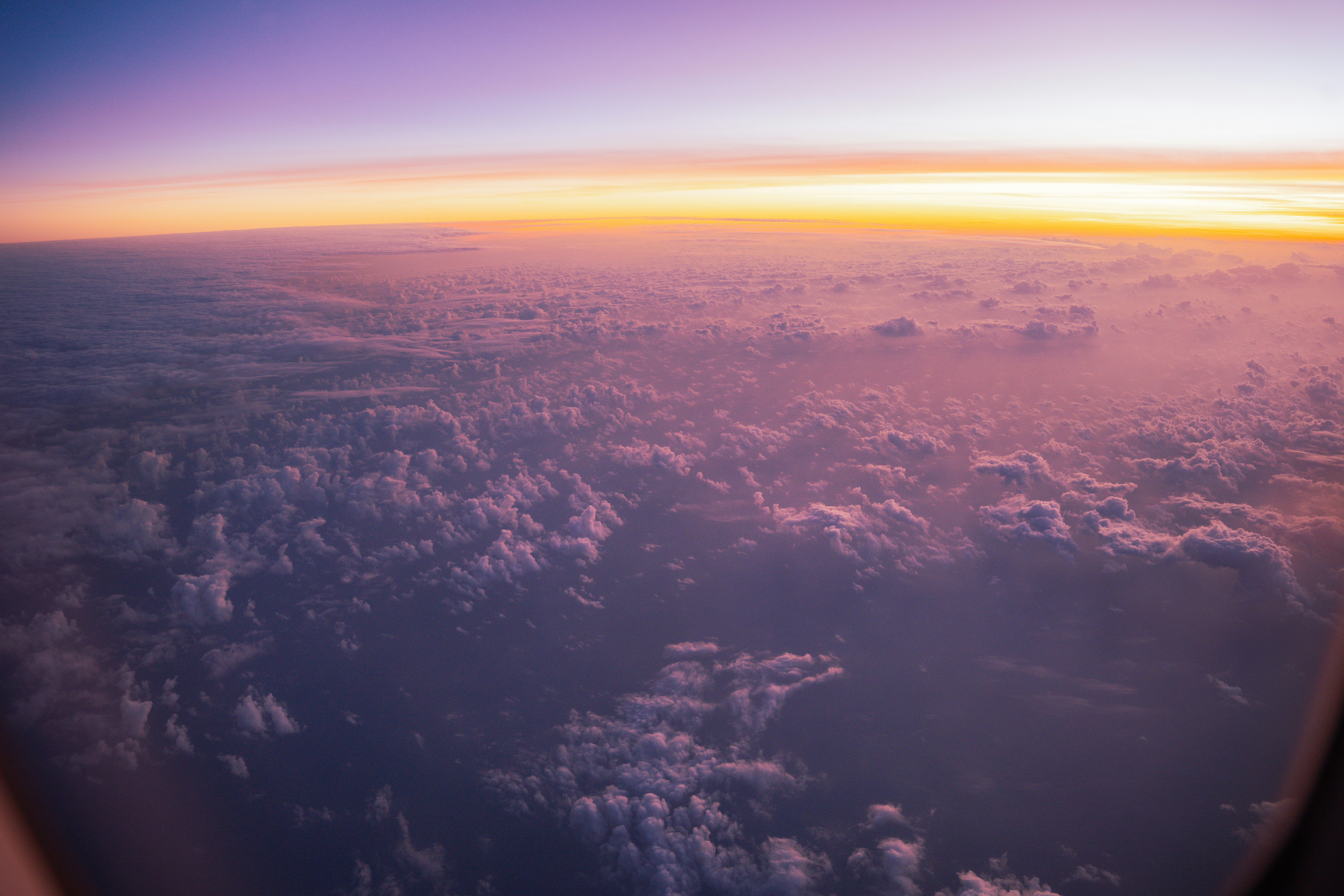 Aircraft in flight above the clouds
